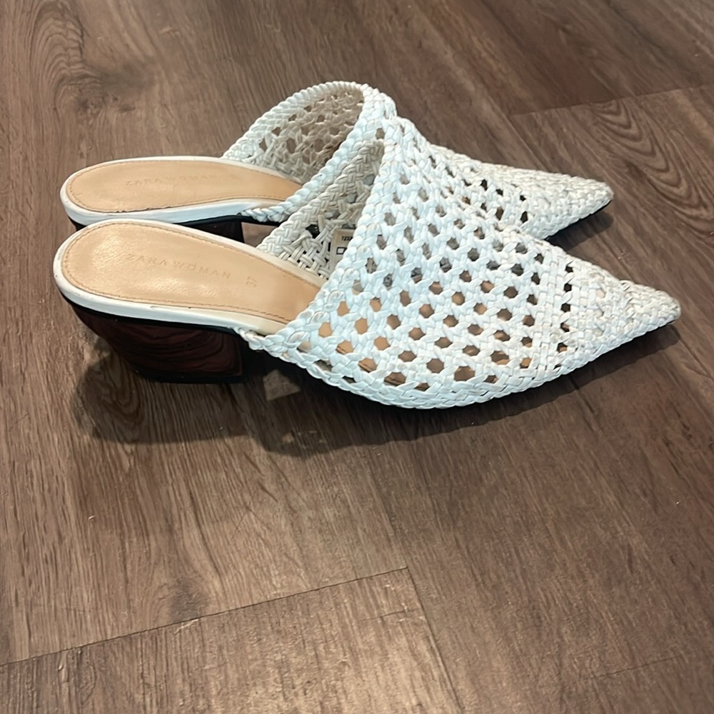 Pointed-toe woven heeled mules with a low block heel and open back design